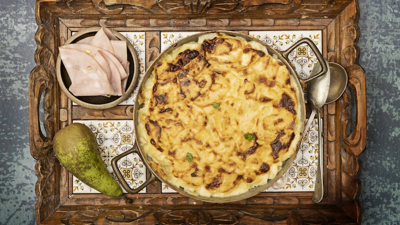 Gratin of parsnip, pear and mortadella. Photograph: Harry Weir