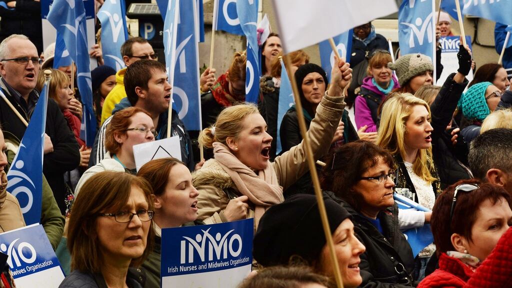 An archive photograph of nurses and midwives protesting outside the offices of the Nursing and Midwifery Board of Ireland, in Blackrock, Co Dublin in 2014. Photograph: Cyril Byrne.