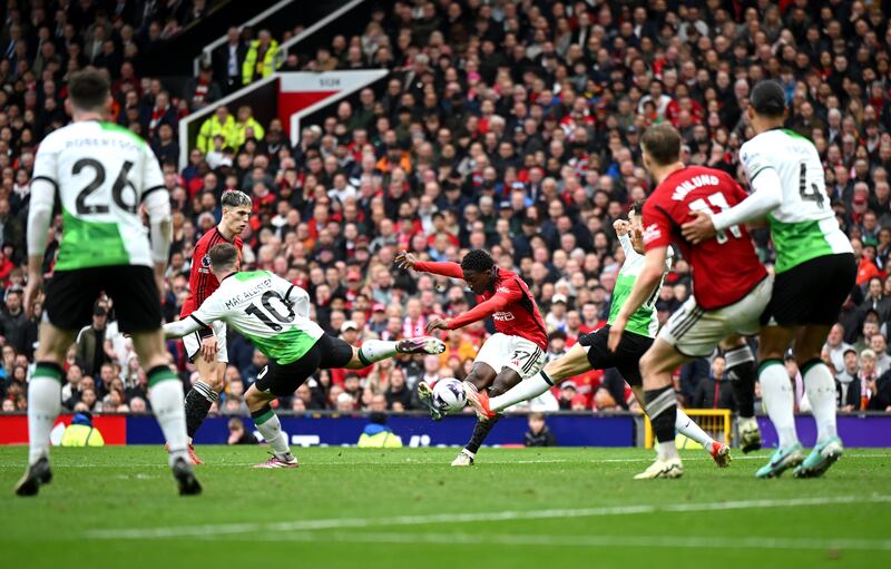 Kobbie Mainoo of Manchester United scores his team's second goal against Liverpool at Old Trafford on Sunday. Photograph: Shaun Botterill/Getty Images