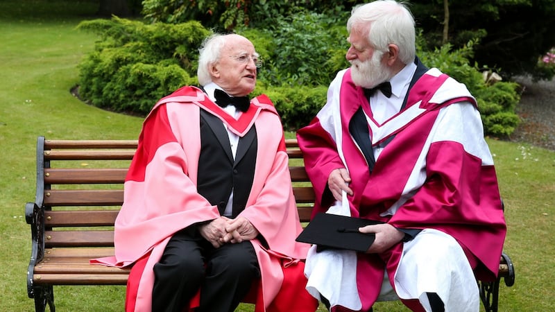 John Sheahan receiving an honorary doctorate in 2013 with President Michael D. Higgins.