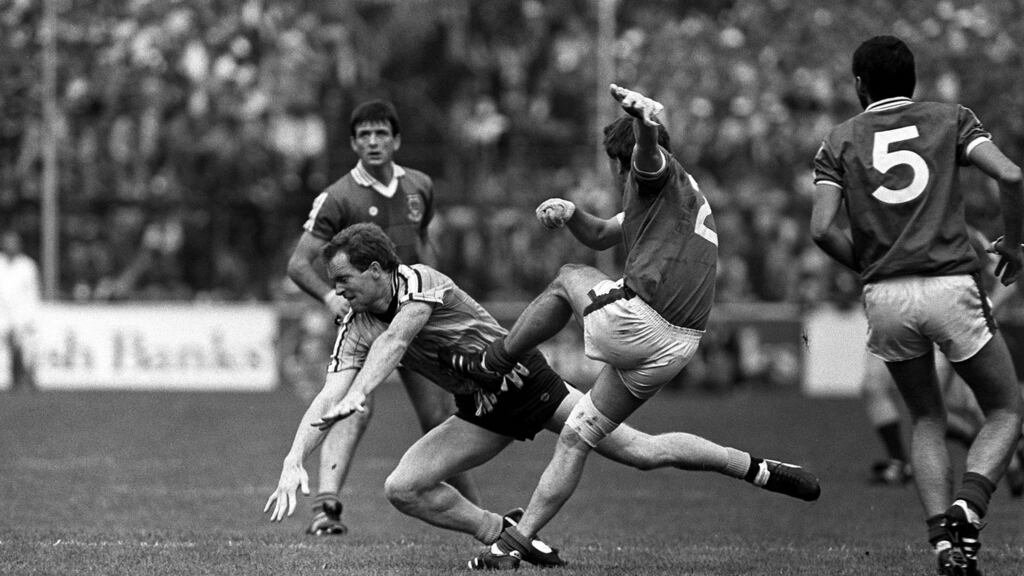 Mayo’s Martin Carney is blocked down by Dublin’s Barney Rock during the 1985 All-Ireland semi-final replay. Photograph: Inpho
