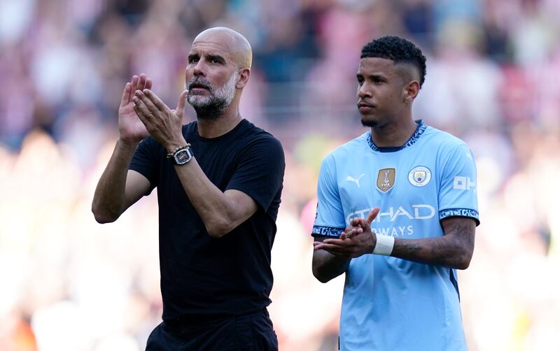 Manchester City manager Pep Guardiola with Savinho after the game at St Marys Stadium. Photograph: Matthews/PA