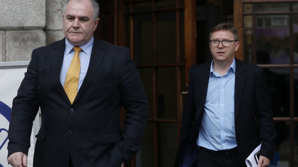 Paul Maguire and Barry O’Kelly of RTÉ pictured leaving the Four Courts  after a High Court action. Photograph: Collins Courts