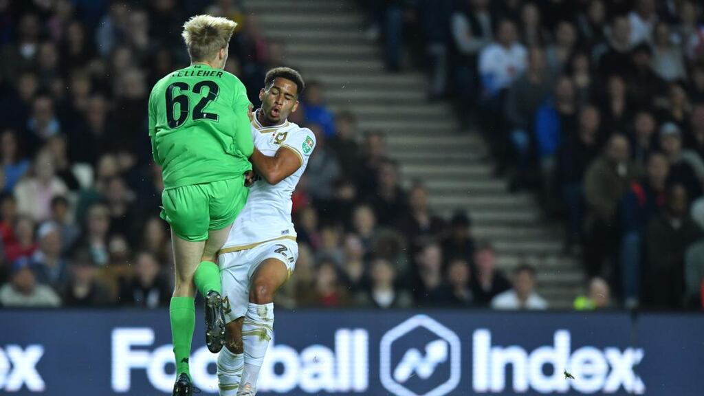 Liverpool’s Irish goalkeeper Caoimhin Kelleher in action against MK Dons. Photograph: Getty Images