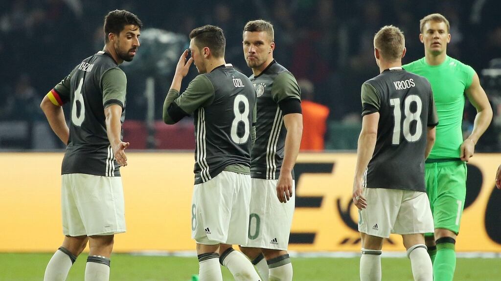 Germany’s Sami Khedira, Mesut Oezil, Lukas Podolski, Toni Kroos and goalkeeper Manuel Neuer react at the end of the friendly defeat to England at the Olympic Stadium in Berlin. Photograph: EPA