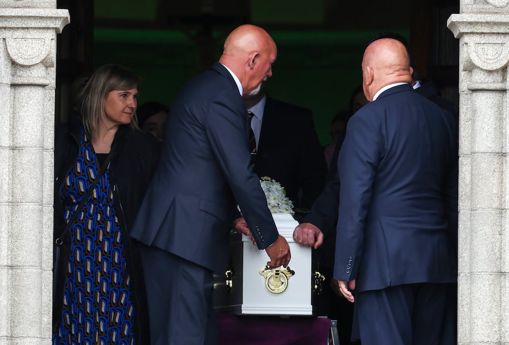 Agnieszka Rode Daczkowska accompanies the coffin of her five-year-old daughter Julia Daczkowska from St Canice's Church, Finglas, after Thursday's memorial Mass. Photograph: Colin Keegan/Collins