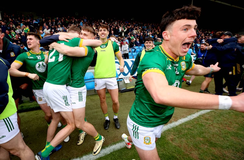 Meath’s Cian McBride, Seán Rafferty and Keith Curtis celebrating near the end of the game against Dublin. Photograph: Ryan Byrne/Inpho