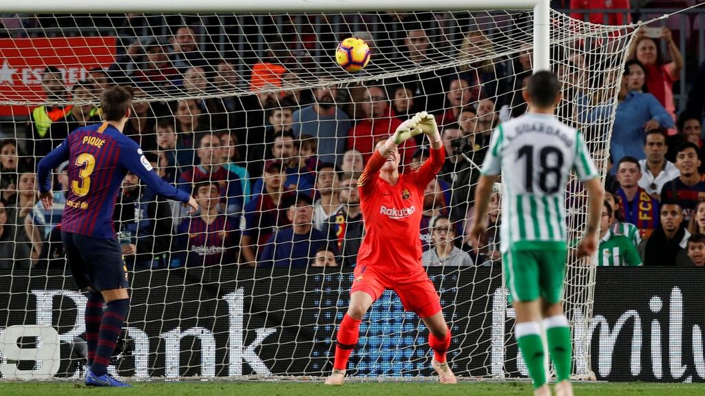 Barcelona goalkeeper Marc-Andre ter Stegen fumbles the ball as Giovani Lo Celso scores Real Betis’ third goal in the La Liga game ay the Nou Camp. Photograph: Albert Gea/Reuters