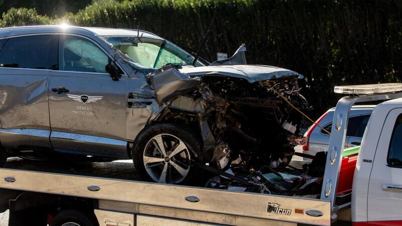 Tiger Woods’s car is taken away on a tow truck after Tuesday’s crash at Rancho Palos Verdes in California. Photograph: Allison Zaucha/The New York Times