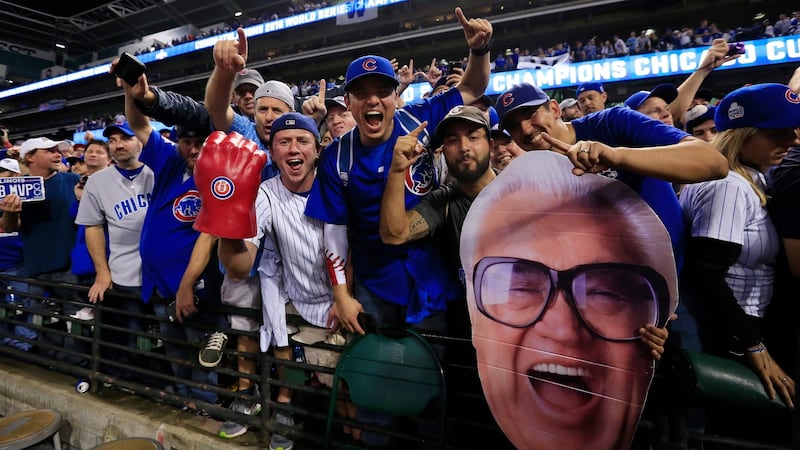 Chicago Cubs fans celebrate the final out as the Cubs win the World Series over the Cleveland Indians at Progressive Field in Cleveland, Ohio. Photograph: Tannen Maury/EPA