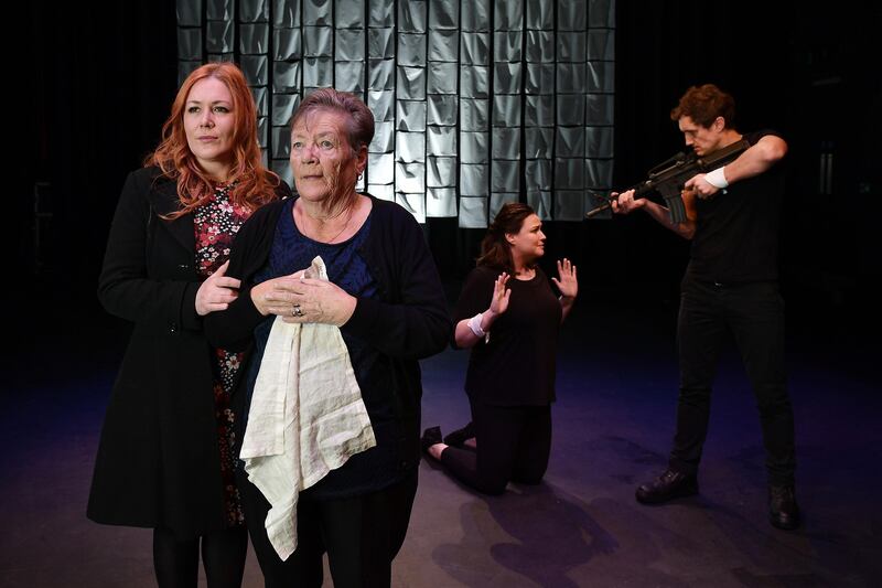 Kay Duddy holds the iconic white handkerchief that belonged to Fr Edward Daly, alongside Julieann Campbell, former Chair of the Bloody Sunday Trust, at Derry Playhouse for the production of The White Handkerchief in Derry. Photograph: Charles McQuillan/Getty Images