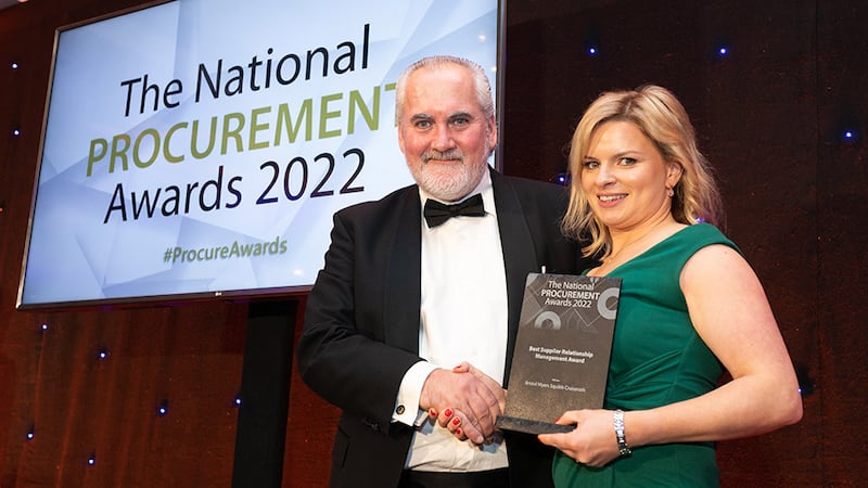 Paul Maguire, Awards Judge, presents the Best Supplier Relationship Management Award to Catherine Lucas, Bristol Myers Squibb Cruiserath.