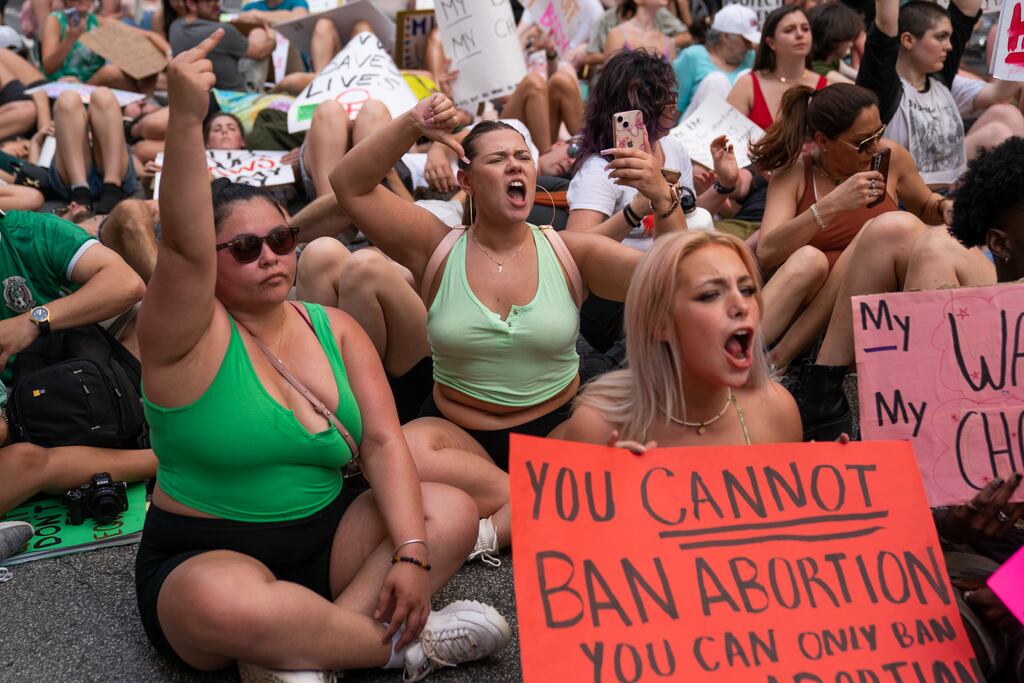People protest in Atlanta, Georgia, against the US Supreme Court's ruling in the Dobbs v Jackson Women's Health Organization. The court's decision overturned the landmark 50-year-old Roe v Wade case, removing a federal right to an abortion. Photograph: Elijah Nouvelage/Getty Images