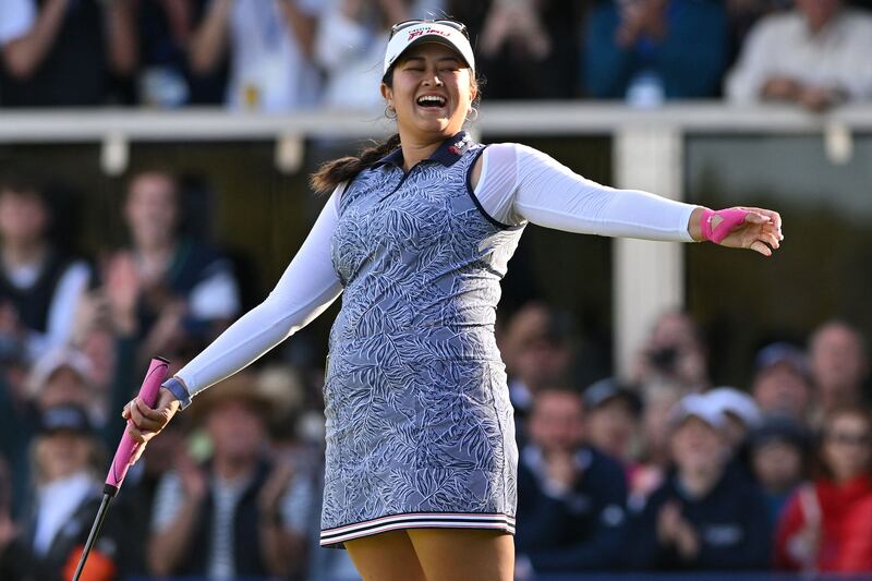 US golfer Lilia Vu reacts after holing her birdie putt on the 18th green to win the 2023 Women's British Open Golf Championship at Walton Heath Golf Club in Walton-on-the-Hill, south-west of London. American Lilia Vu sealed her second Major title of the year with a dominant six-shot victory over Charley Hull. Photograph: Glyn Kirk/AFP/via Getty Images