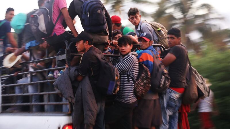 Members of the Central American migrant caravan heading towards the US in Juchitan de Zaragoza, Mexico, on Thursday. Photograph: Spencer Platt/Getty Images