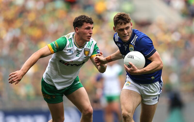 Donegal's Finnbarr Roarty and Gavin White of Kerry. Photograph: Bryan Keane/Inpho