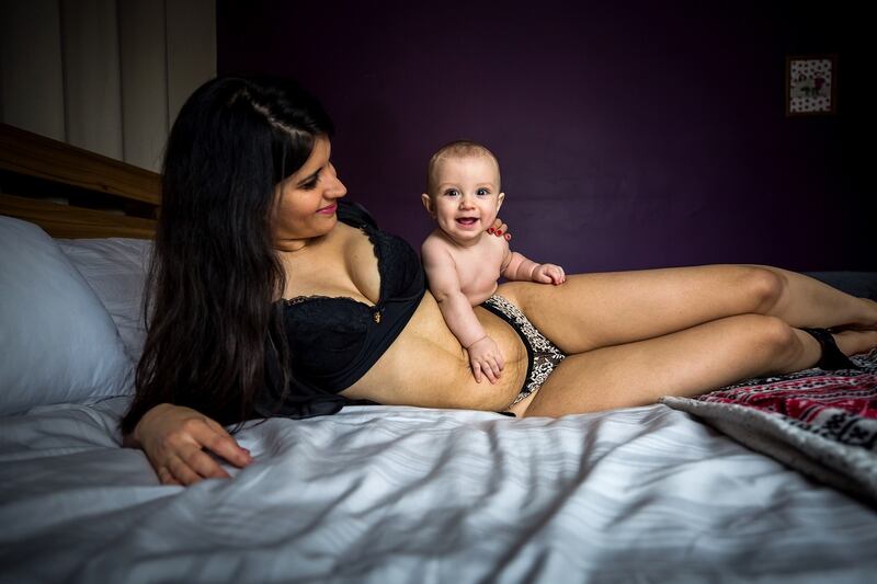 Amanda Ponte, from Swords, Co Dublin, with her son Tagh Cook. The image is part of a photographic campaign to be launched on December 1st. Marian Kennedy, founder of anewmum, teamed up with US photographer
Neely Ker-Fox for the celebration of the postpartum body.