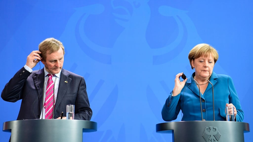 Taoiseach Enda Kenny and German chancellor Angela Merkel at a joint news conference in Berlin, Germany. Photograph: John MacDougall/AFP/Getty Images