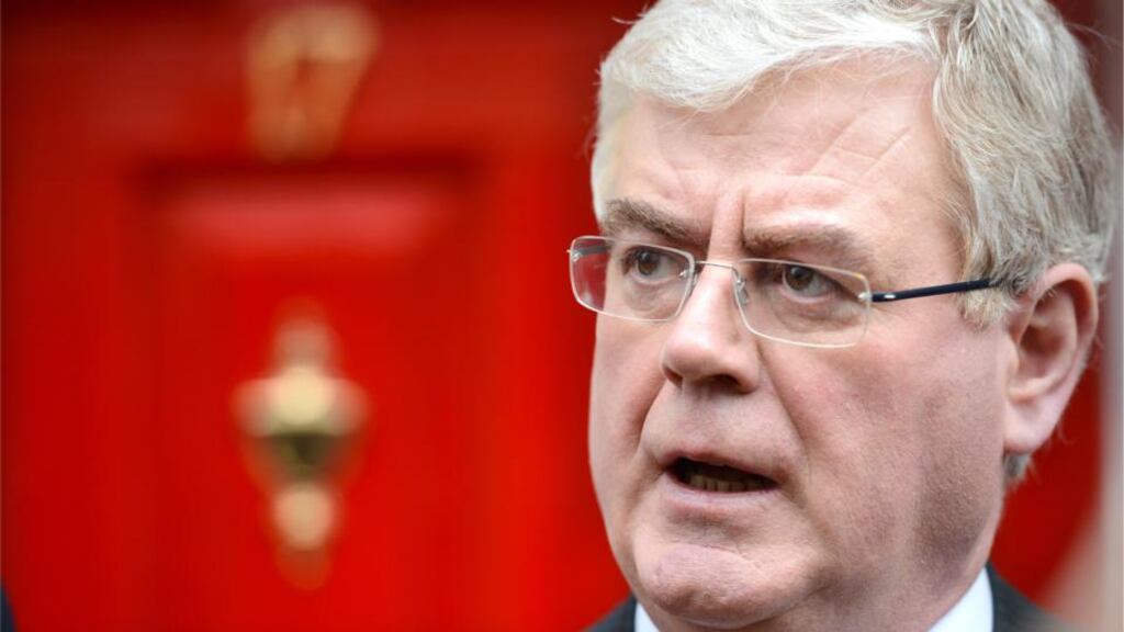Tánaiste Eamon Gilmore was standing in yesterday for the Taoiseach, who was in Brussels explaining that an Apple a day helps the multinationals stay. Photograph: Dara Mac Donaill