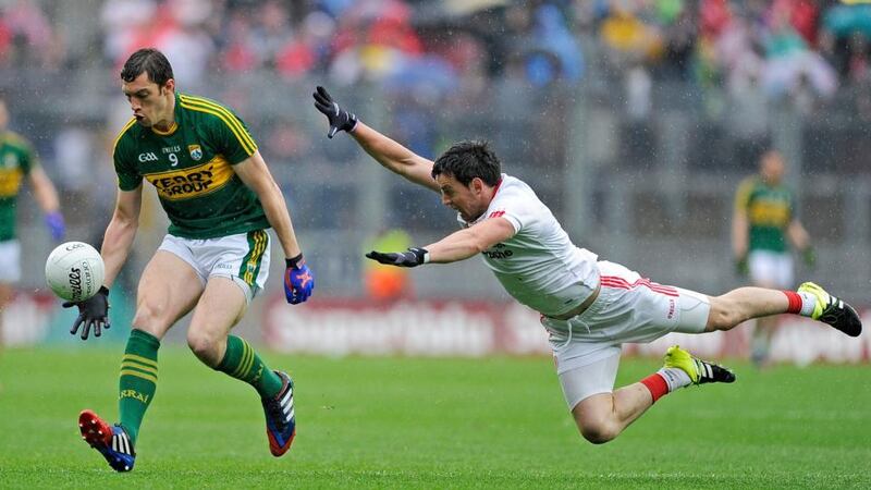 Matthew Donnelly tries to block Kerry’s David Moran at Croke Park. Photograph: Tommy Grealy/Inpho