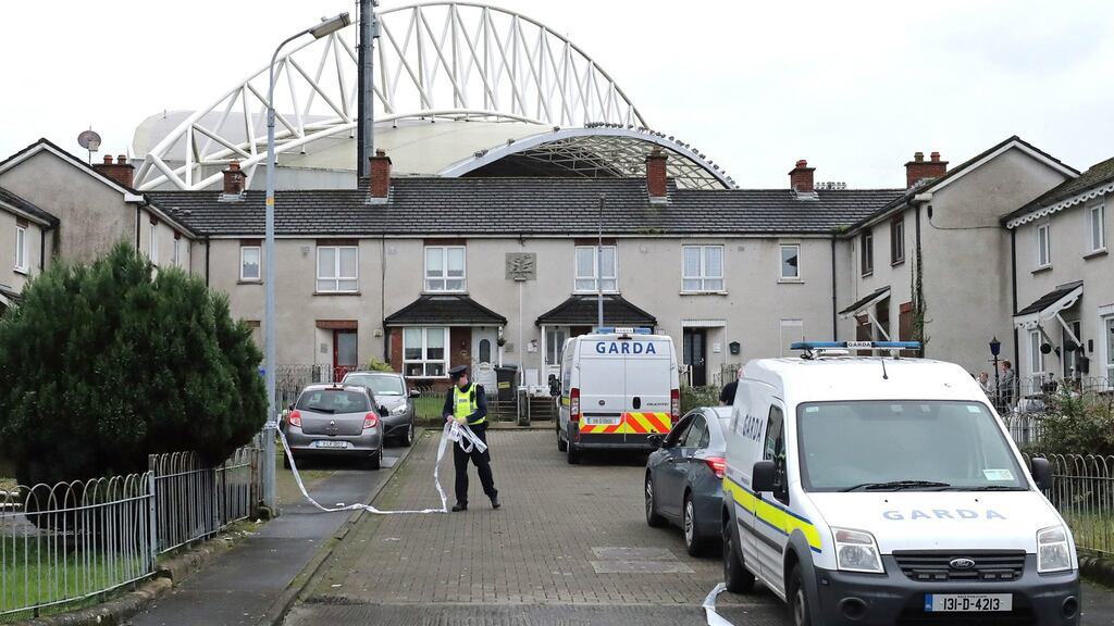 Gardaí at a house in Shanabooly Road in Limerick where the body of an 11-year-old boy was discovered on Sunday evening. Photograph: Niall Carson/PA Wire.