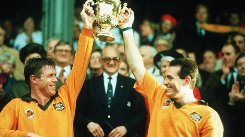Nick Farr-Jones and David Campese with the William Webb Ellis Trophy in 1991. Photograph: Billy Stickland/Inpho