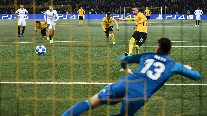 Young Boys’ Guillaume Hoarau scores from the penalty spot against Valencia, the club’s first Champions League goal. Photograph: Fabrice Coffrini/AFP/Getty Images