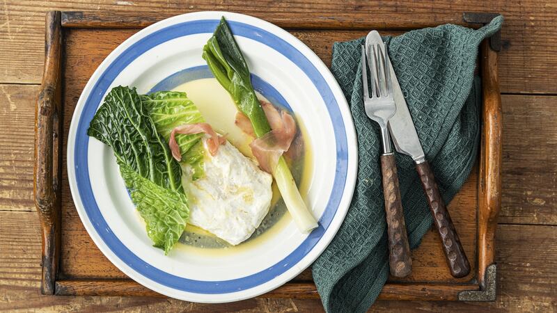 Baked hake, savoy cabbage, pickled ginger butter