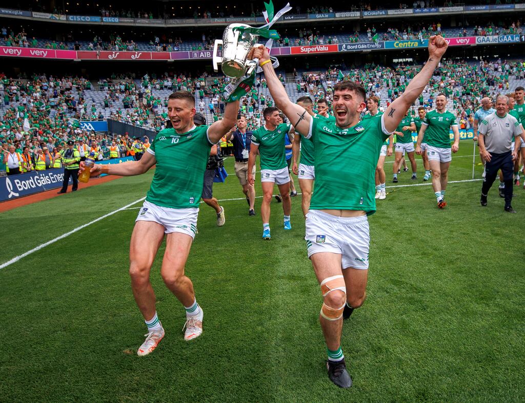 Limerick's Gearoid Hegarty and Aaron Gillane celebrate with the Liam MacCarthy Cup. Photograph: James Crombie/Inpho