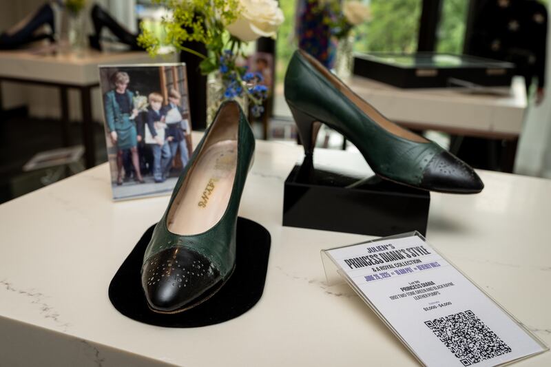 Princess Diana 1992 two-tone green and black Rayne leather pumps are also due to be auctioned. Photograph: Aaron Chown/PA