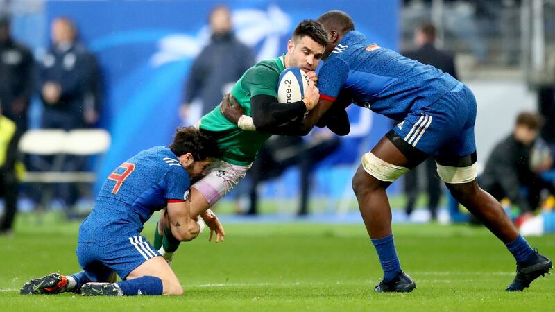 France’s Maxime Machenaud and Yacouba Camara tackle Conor Murray. Photograph: James Crombie/Inpho