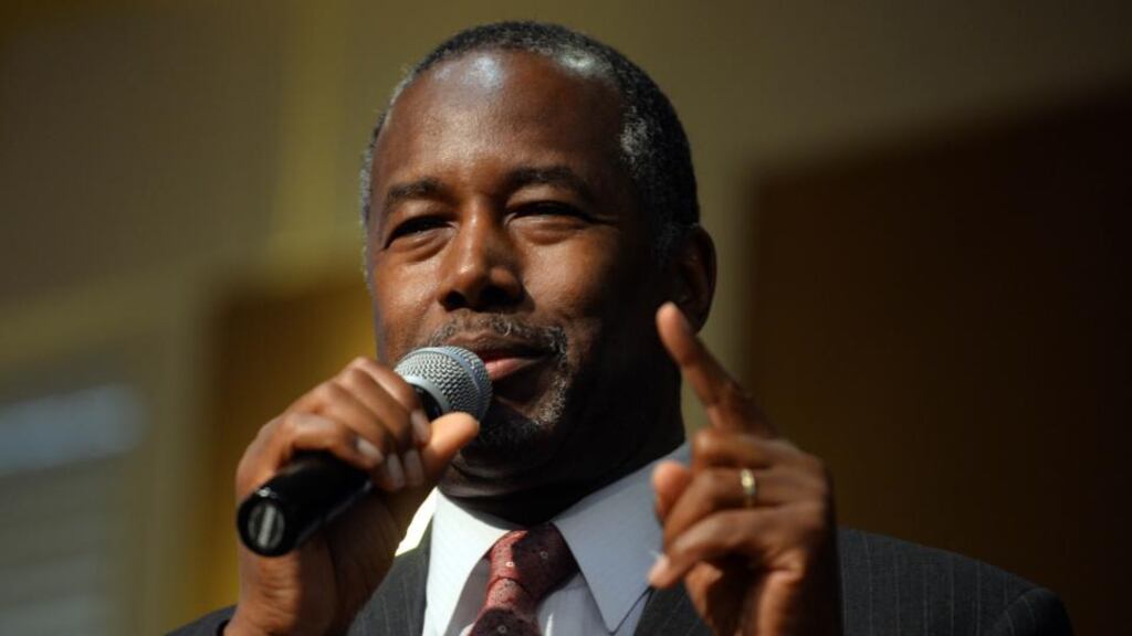 Republican presidential candidate Ben Carson: Rupert Murdoch tweeted: ‘What about a real black president who can properly address the racial divide?’ Photograph: Darren McCollester/Getty Images