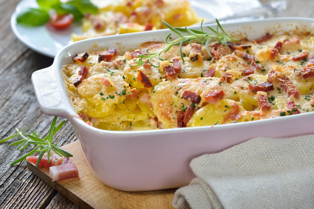 Herby potato and bacon gratin. Photograph: iStock