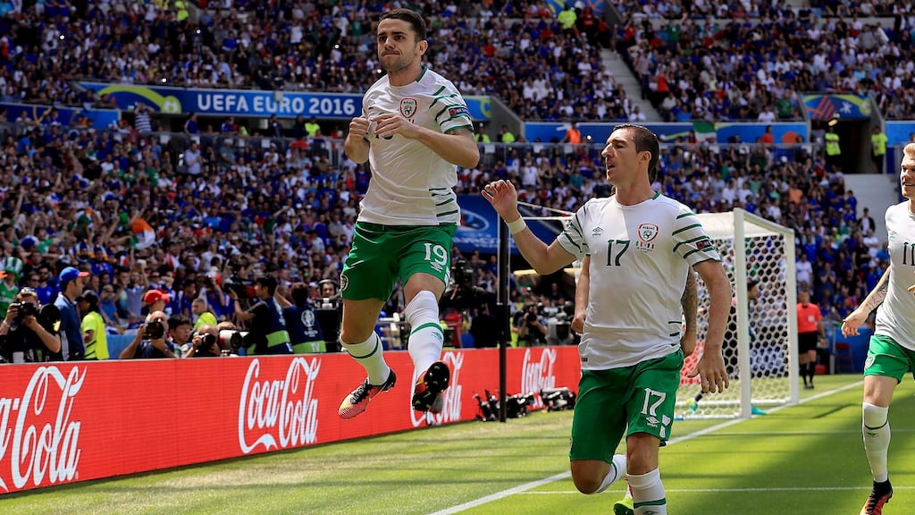Robbie Brady celebrates with Republic of Ireland team-mate Stephen Ward after scoring from the penalty spot in the European Championship Round Of 16 match at Parc Olympique Lyonnais in Lyon. Photograph: Donall Farmer/Inpho