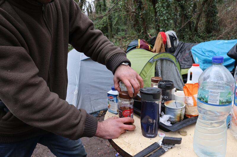 Some homeless men live in the tents in a wooded area beside Ashtown, Dublin. Photograph: Dara Mac Dónaill