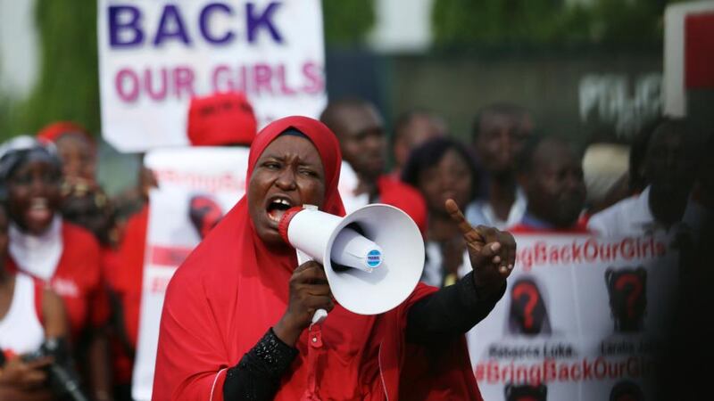 The mass kidnapping sparked protests world-wide. A protester addresses a “Bring Back Our Girls” protest group as they march to the presidential villa to deliver a protest letter to Nigeria’s President Goodluck Jonathan in Abuja, calling for the release of the Nigerian schoolgirls in Chibok who were kidnapped by Islamist militant group Boko Haram. Photograph: Afolabi Sotunde/Reuters