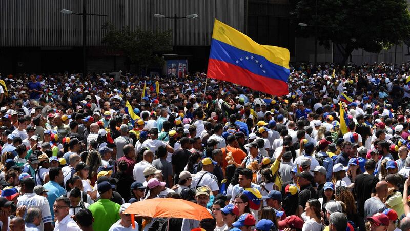 Venezuelan opposition supporters protest in Caracas on the anniversary of the 1958 uprising that overthrew the military dictatorship. Photograph: AFP/Getty Images
