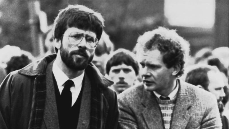 Identified with the IRA: Gerry Adams and Martin McGuinness at a republican funeral in 1987. Photograph: AP
