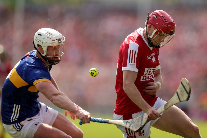 Cork's Alan Connolly and Michael Breen of Tipperary. Photograph: Laszlo Geczo/Inpho