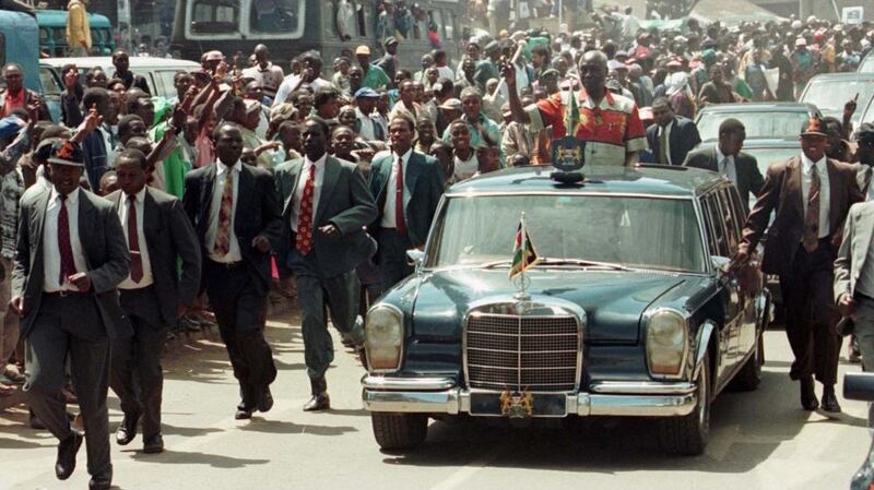 Daniel arap Moi, surrounded by heavy security, campaigning in Nairobi during the December 1997 elections. Photograph: Corinne Dufka/Reuters