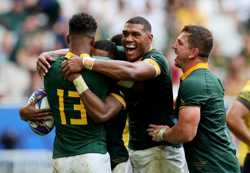 Grant Williams of South Africa celebrates with Canan Moodie, Damian Willemse and Kwagga Smith after scoring his team's seventh try during their the Rugby World Cup match against Romania. Photograph: Jan Kruger/Getty Images Sport