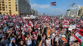 Protesters in Lebanon taste first victory with resignation of four ministers