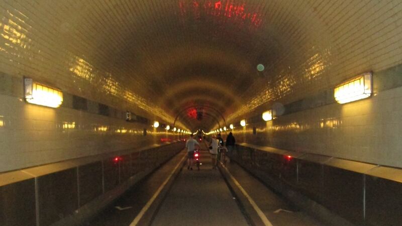 A hundred-year-old tunnel connects cyclists and pedestrians from the city center to the harbour district. Photograph: Bernie Duffy