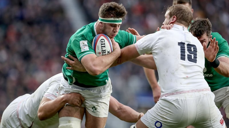 Ireland’s Caelan Doris is tackled by Ellis Genge and Joe Launchbury of England at Twickenham on Sunday. Photograph: Dan Sheridan/Inpho