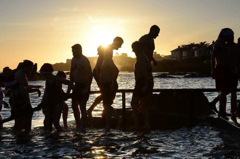 25/12/2019 - NEWS - Enjoying a Christmas swim at the forty foot, Sandycove, Co. Dublin on Christmas morning.Photograph: Dara Mac Dónaill / The Irish TimesPhotograph: Dara Mac Donaill / The Irish Times