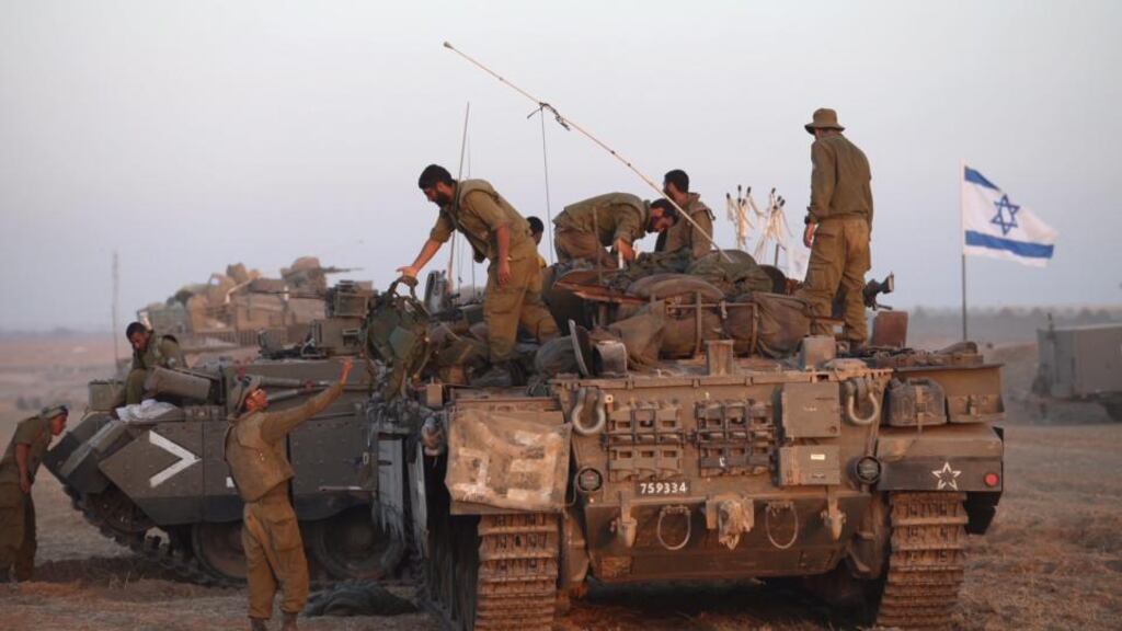 Israeli soldiers on the Israeli border with the Gaza Strip. It is expected that within the next few days Israel’s security cabinet will take a decision on whether to launch a ground offensive into Gaza. Photograph: EPA/Abir Sultan