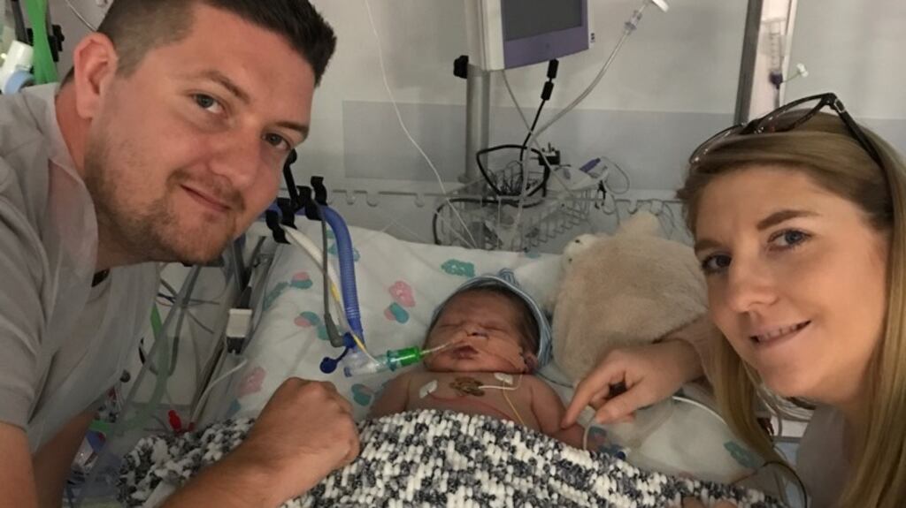 Simon and Sorcha McMahon pictured with baby Henry.