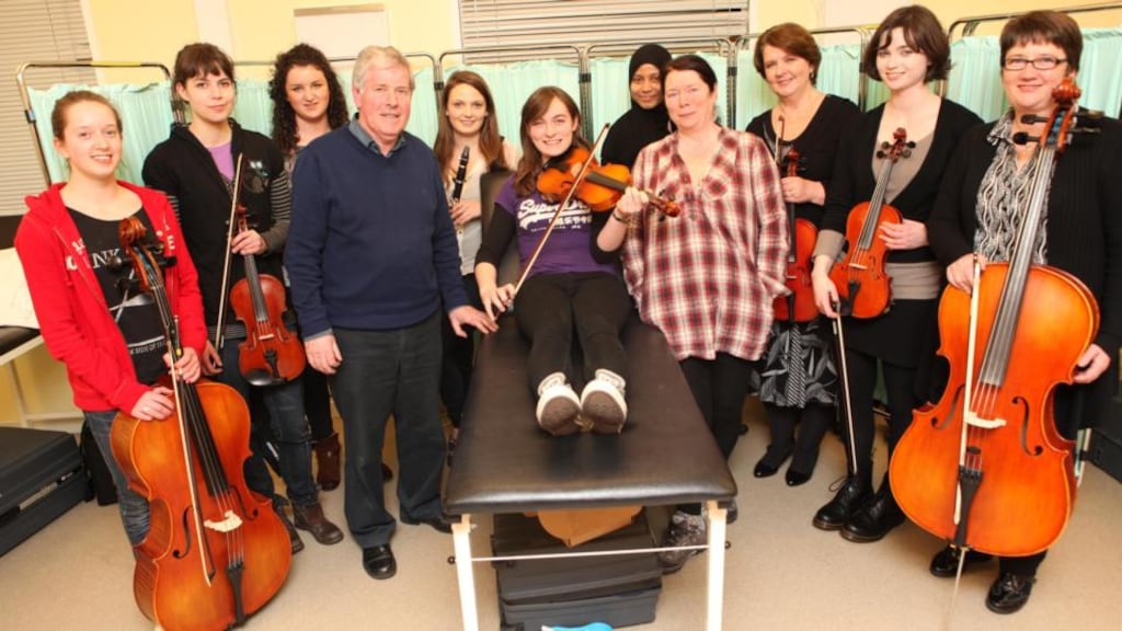 Members of the NUI Galway Medical Orchestra with Carl Hession and Mary McPartlan. NUIG’s medical orchestra was founded in 2011, and is open to students in the schools of medicine, nursing, midwifery and health sciences. Photograph: Aengus McMahon