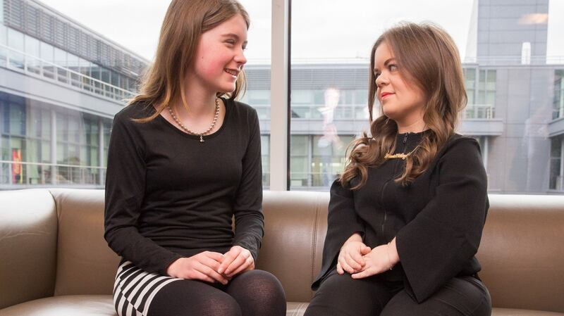 Niamh Scanlon, EU Digital Girl of the Year 2015 (left), and Sinead Burke, teacher, broadcaster and fashion blogger, on the sidelines at Accenture’s International Women’s Day 2016 event at the Convention Centre Dublin. Photograph: Naoise Culhane