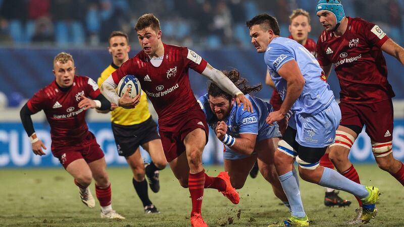 Munster outhalf Jack Crowley makes a break during the Heineken Champions Cup game against Castres at Stade Pierre-Fabre. Photograph: Ryan Byrne/Inpho